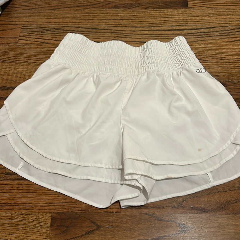 High waisted white shorts. Athletic. Size small.